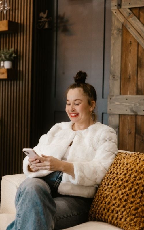 Olga Halatsevich sitting on couch